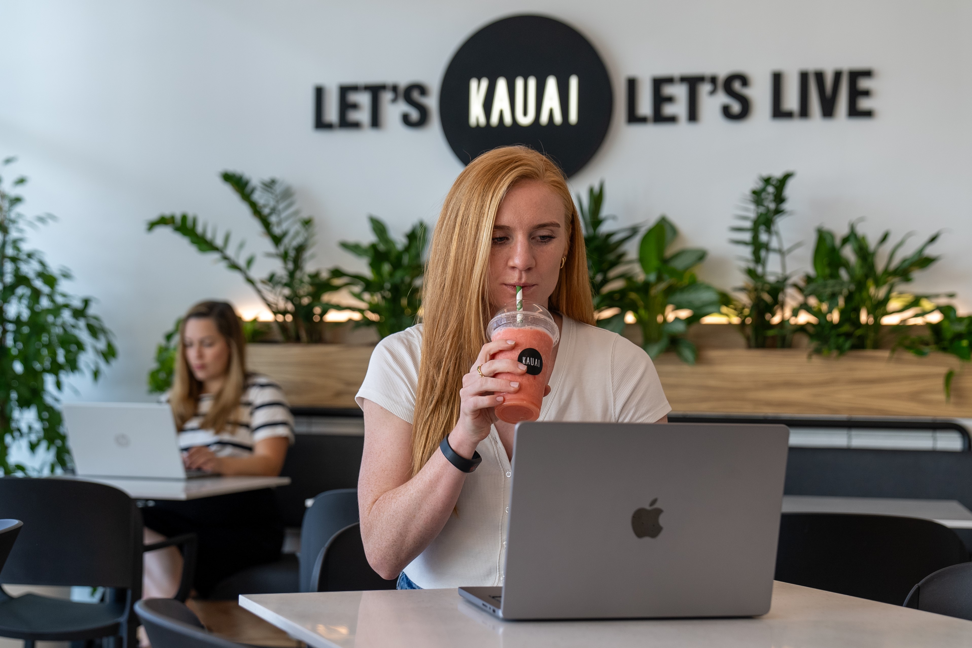 Virgin Active Mill Hill member working from the Kauai lounge